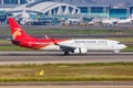 Shenzhen Airlines Boeing 737-800 airplane Guangzhou Baiyun airport in China Royalty Free Stock Photo