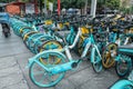 shared bikes on the side of the road in day time Royalty Free Stock Photo