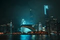 Guangzhou by night, China city skyline panorama over the Pearl River.