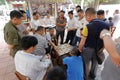 Guangzhou people play chinese chess by the road