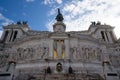 Guard of Honor is on duty at the grave of the unknown soldier under the statue of the goddess Roma on the facade of the monument Royalty Free Stock Photo