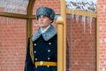 Guard of the Presidential regiment of Russia near Tomb of Unknown soldier and Eternal flame in Alexander garden near Kremlin wall