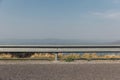 The guard rail, barrier on wayside with cloudy and hill. Royalty Free Stock Photo