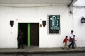 A guard stands outside the presidential campaign office of the Green Party in Popayan, Colombia