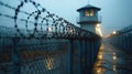 Guard tower in prison and barbed wire fence on jail border. with copy space Royalty Free Stock Photo