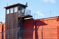 A guard tower on prison wall Royalty Free Stock Photo