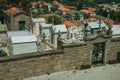 Cemetery with stone walls encircling tombs and crypts