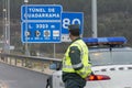 Guardia Civil next to his car watches traffic Royalty Free Stock Photo