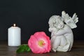 Guardian angel, flower and candle Royalty Free Stock Photo