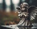 Guardian angel on the grave, copy space. Weathered figurine on rainy day Royalty Free Stock Photo