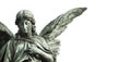 Guardian angel sculpture with open long wings desaturated isolated on wide panorama banner background empty text space.