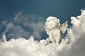 Guardian angel sitting on the cloud Royalty Free Stock Photo