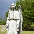 Guardian angel statue in graveyard. Royalty Free Stock Photo
