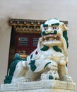 A guardian lion at buddhist temple entrance