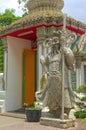 Guardian statue at Wat Phra Kaew, Temple of the Emerald Buddha, Grand Palace, Bangkok Royalty Free Stock Photo