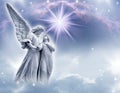 Guardin angel over a divine mystic background with stars