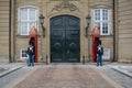 Guards at Amalienborg - Royal Castle in Copenhagen. Denmark