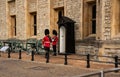 Guards changing ceremony in the historic Tower of London where Royal jewelry collection held.