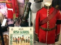 Inside the Guards Museum of London, exhibits of uniforms and weapons