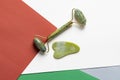 Guasha green natural gemstone face roller. Anti aging self care tool.