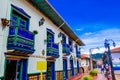 GUATAPE, COLOMBIA - OCTOBER 19, 2017: Beautiful colorful streets and decorated houses of Guatape city near Medellin