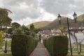 Guatavita colombian town summer scene with pine peatonal street, gardens and mountains