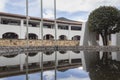 Guatavita town hall building at midday with water refflection