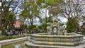 Antigua, Guatemala - March 2013: Visiting the Central Plaza with water fountain in Antigua, Guatemala