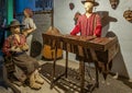 3 dolls play music, Finca La Azotea, La Antigua, Guatemala