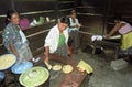 Guatemalan Indian family preparing tortillas