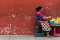 Guatemalan Woman Cuts Fruit on Street