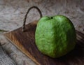 Guava fruit on wooden background Royalty Free Stock Photo