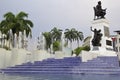 Guayaquil, Ecuador. View of the Planchado park from above, with a fountain, statue and the city in the background