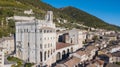 Gubbio, Italy. Drone aerial view of the city center, main square and the historical building called Palazzo dei Consoli