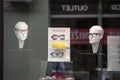 Gucci logo in front of their main boutique selling glasses eyewear and sunglasses.