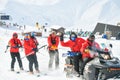 Gudauri, Georgia - 15th february, 2022: ski rescue team on practice in winter ski resort enjoy work have fun. Snowmobile drag