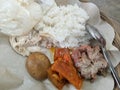 gudeg rice with chicken eggs and crackers, original from Indonesia