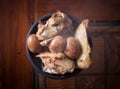 Gudeg traditional exotic indonesian food with kendil and wooden table view from top