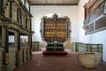 Gudow, Germany, November 13, 2020: St. Mary`s Church chancel with pews, baptismal font and the medieval carved altar in the