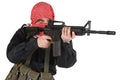 Guerillas in black uniform with keffiyeh fire assault rifle Royalty Free Stock Photo