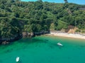 Guernsey small beach with sea, cliffs and little boat Royalty Free Stock Photo