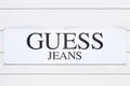 Guess logo on a wall