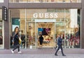 Guess luxury fashion house store entrance with brand signage