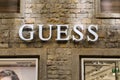 Guess store sign hanging in Florence, Italy Royalty Free Stock Photo
