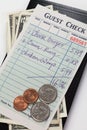 Guest Check and dollar Royalty Free Stock Photo