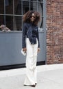 A guest poses after the Donna Karan fashion show during New York Fashion Week