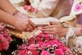 Guest pouring water with bride and groom hands in water relaunch ceremony. Thai traditional wedding Royalty Free Stock Photo