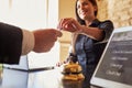 Guest Takes Room Key Card At Check-in Desk Of Hotel, Close Up