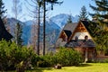 Guesthouse and mountain snowy landscape horizon