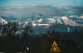 Guesthouse and mountain snowy landscape horizon in Zakopane